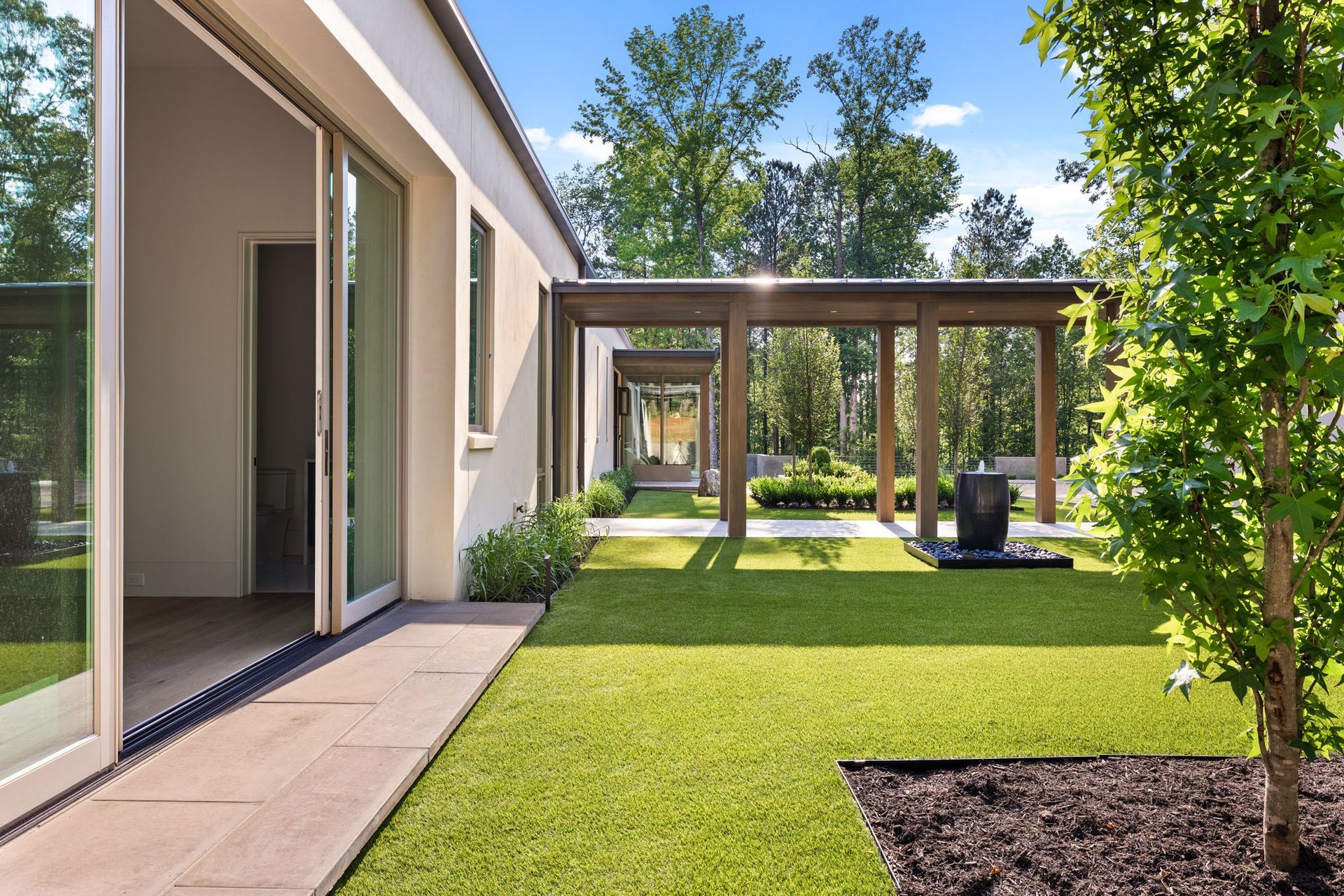 Covered courtyard walkway with timber pergola