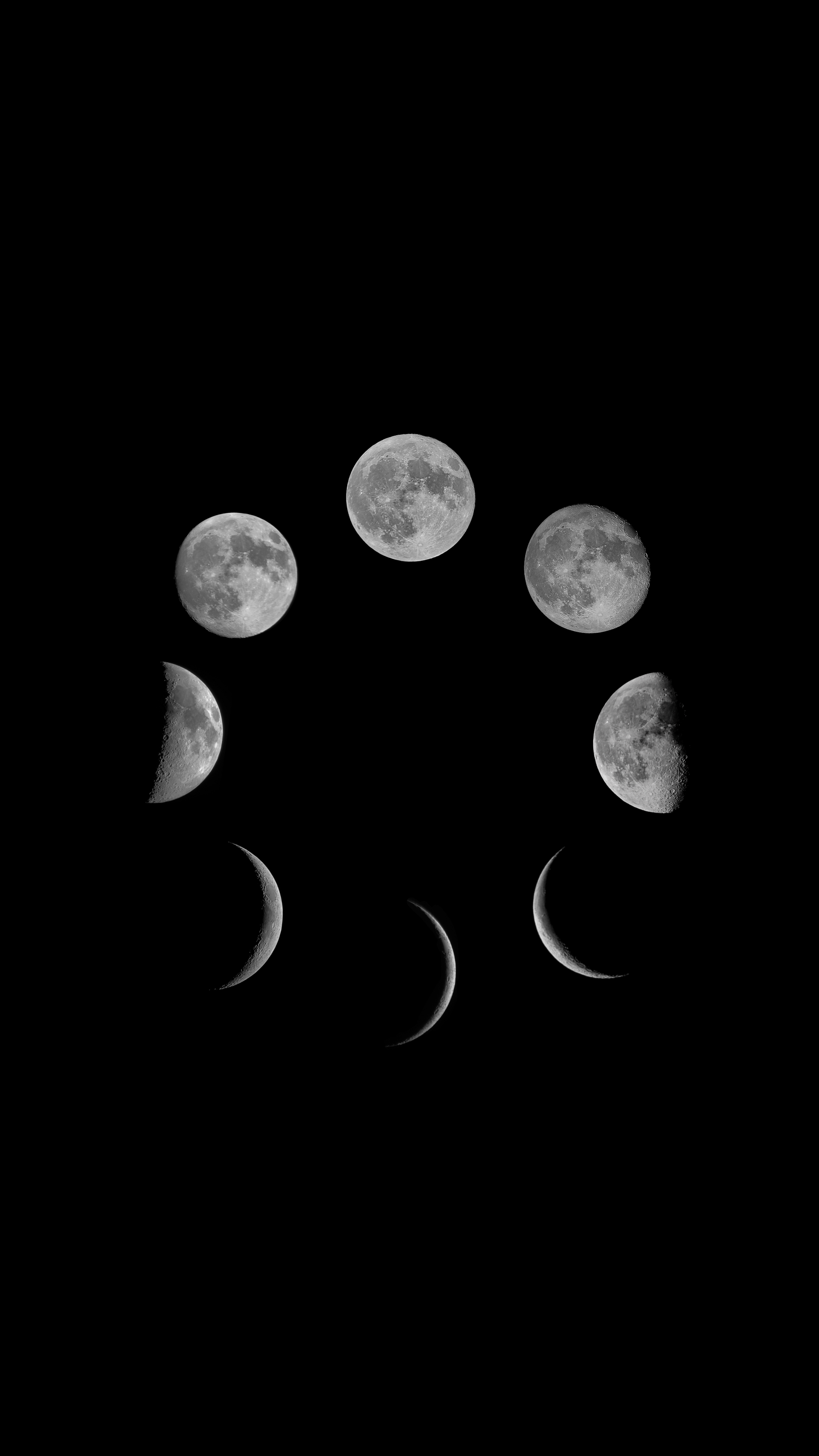 Phases of the moon arranged in a semicircle on a black background
