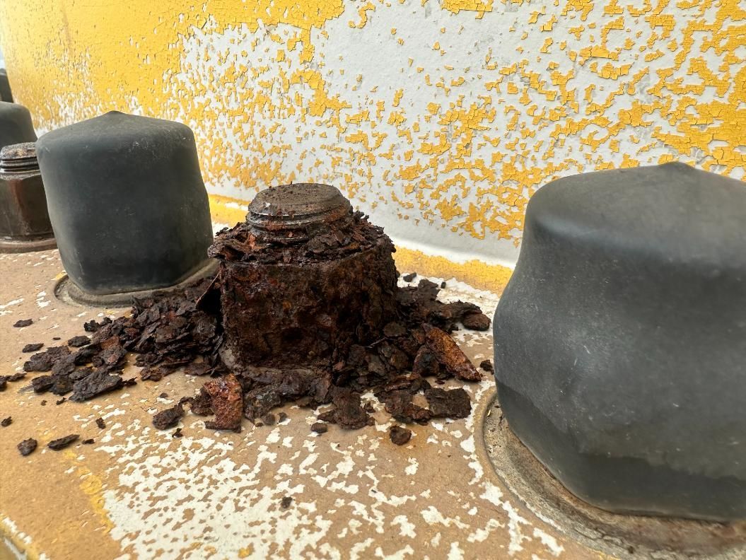 A Close Up Of A Rusty Piece Of Metal On A Table — LJ's Technical Services In Burdell, QLD