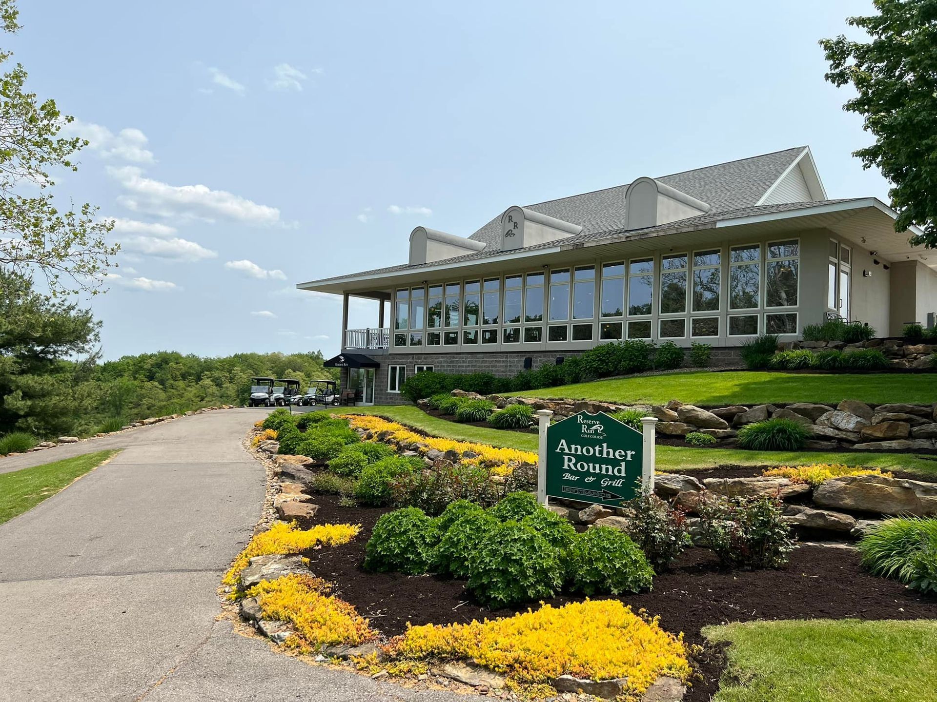 Building with large windows and sign reading 