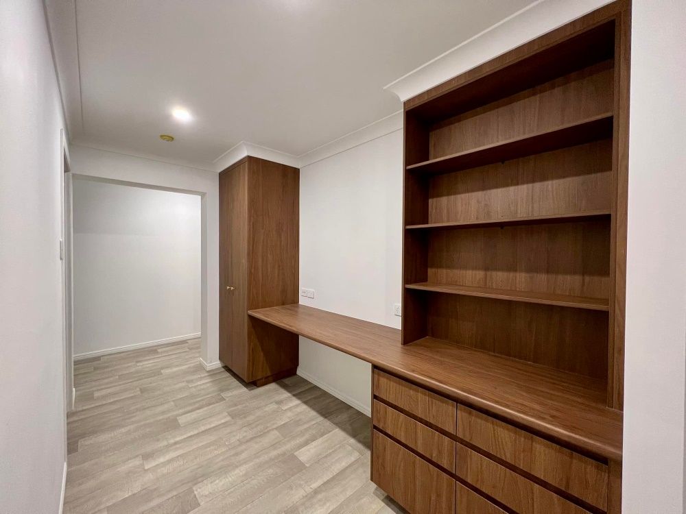A Room With A Desk And Shelves In It — O'Donnell Cabinetmaking in Kawana, QLD