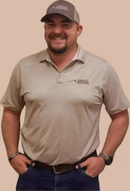 A man wearing a hat and a shirt that says ' alpine ' on it