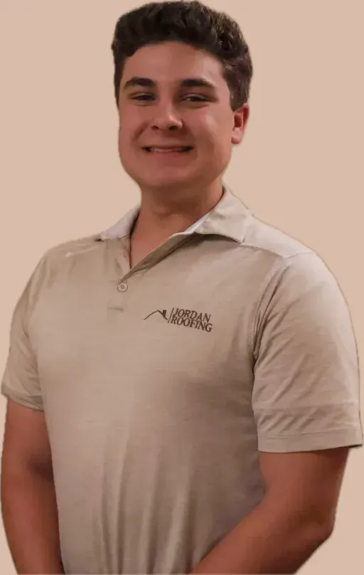 A young man wearing a tan shirt that says everyday cleaning