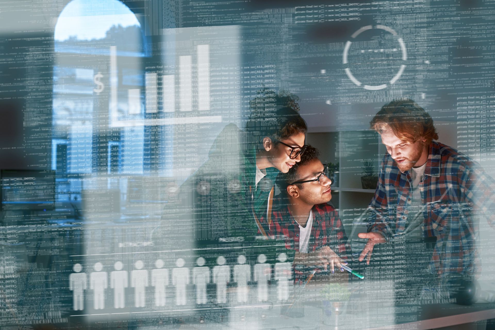 Three people, lit by screen light, collaborate over data visualizations.