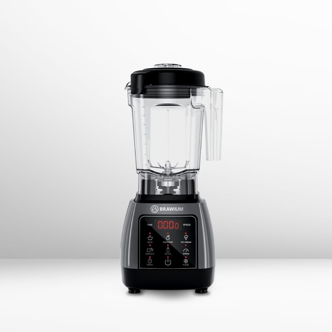 Blender abu-abu dan hitam dengan stoples bening dan layar digital.