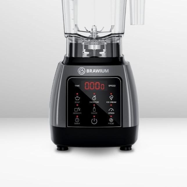 Blender Brawium berwarna abu-abu dan hitam dengan layar digital dan tombol prasetel pada permukaan putih.