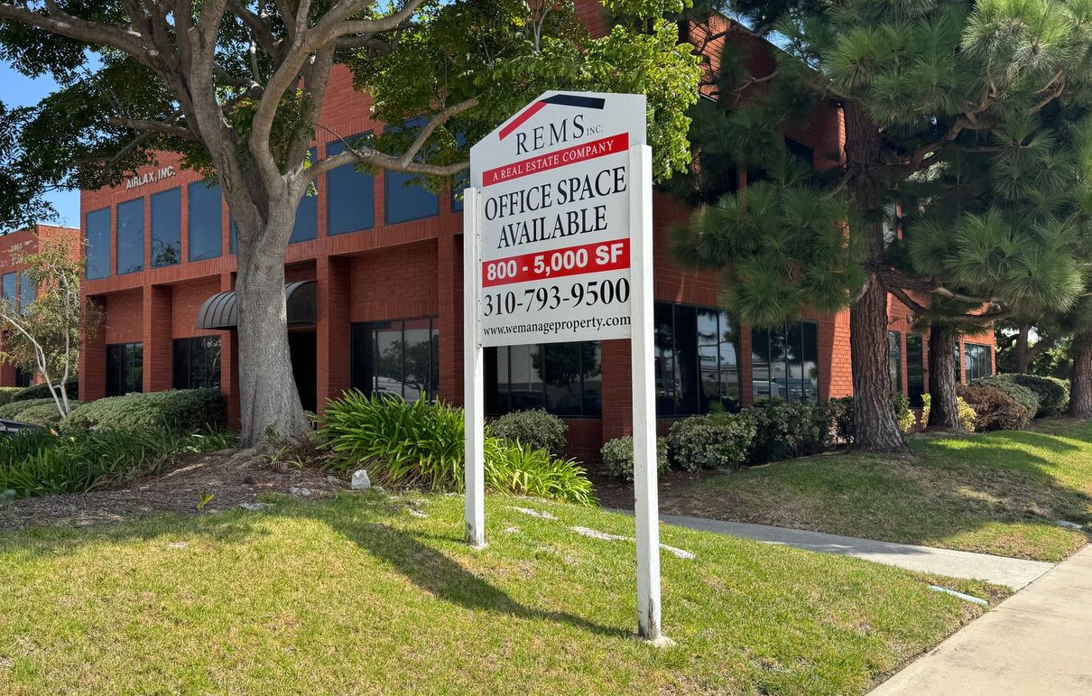 REMS property management office sign on Crenshaw Blvd in Torrance