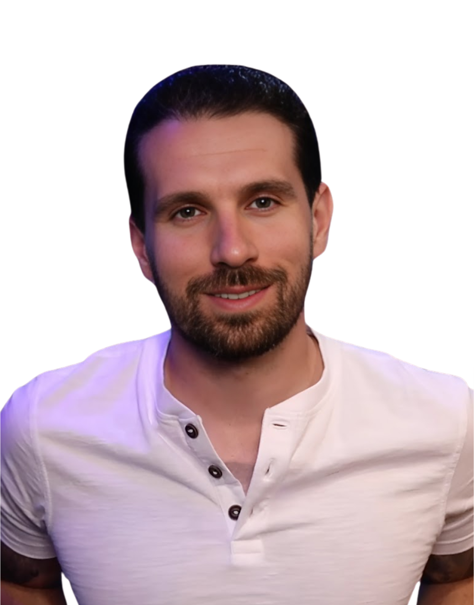 A man in a suit and blue shirt is smiling for the camera.