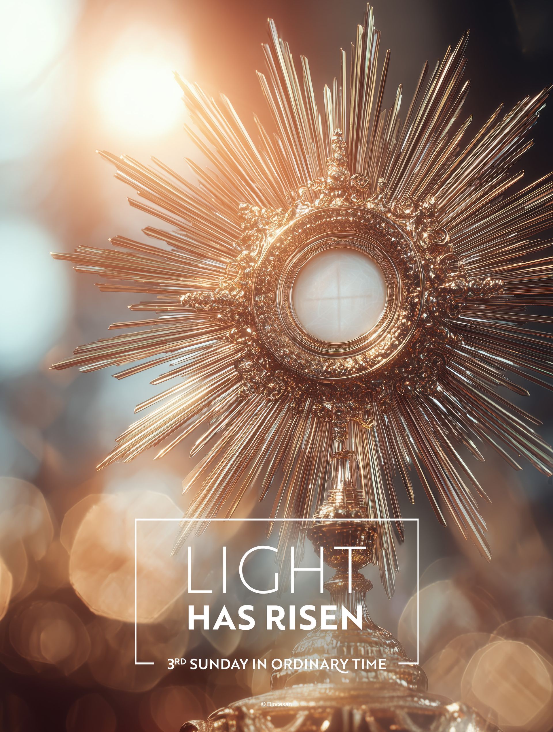 Golden monstrance radiating light, with text 