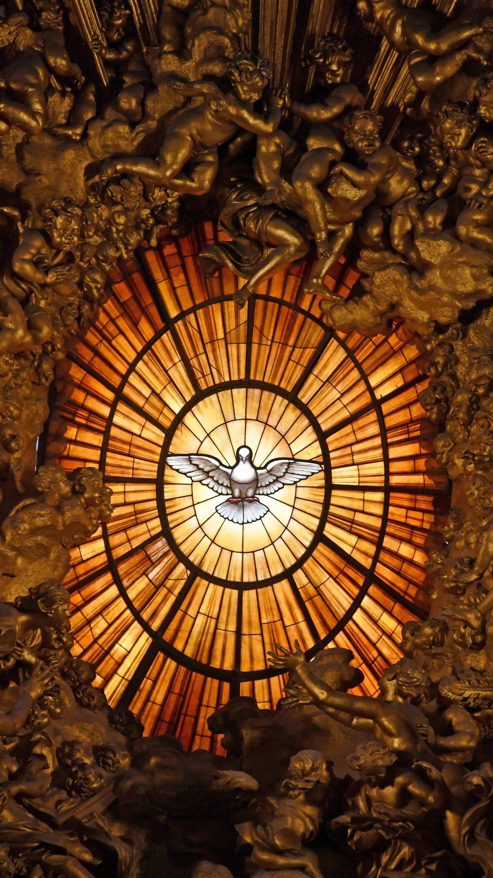 Abstract orange sunburst light centered in a dark, textured decorative frame