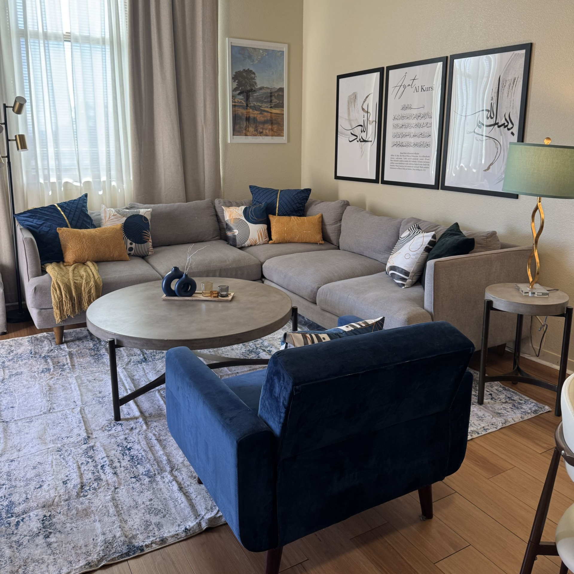 Organized living room with sofa and natural light, Oakland