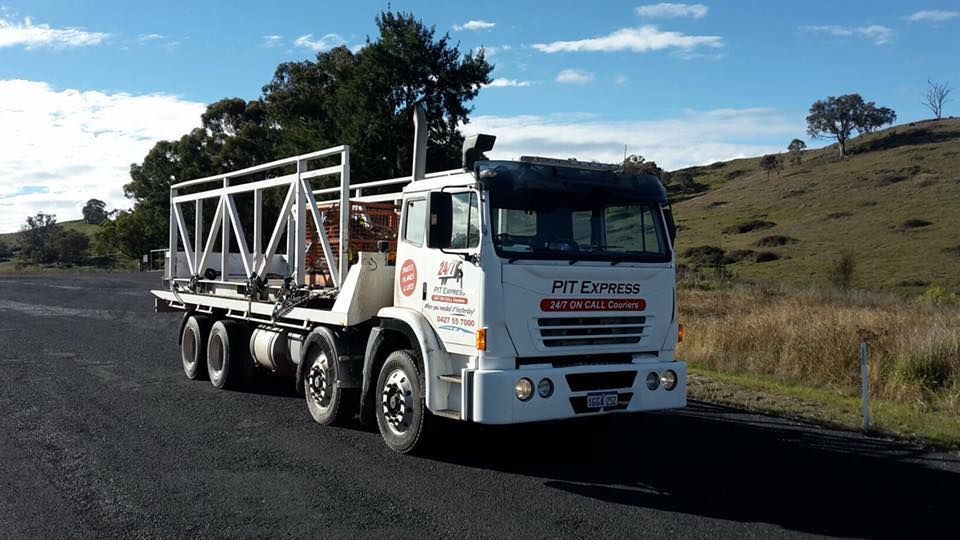 White Truck is Parked on the Side of the Road — Pit Express in Beresfield, NSW