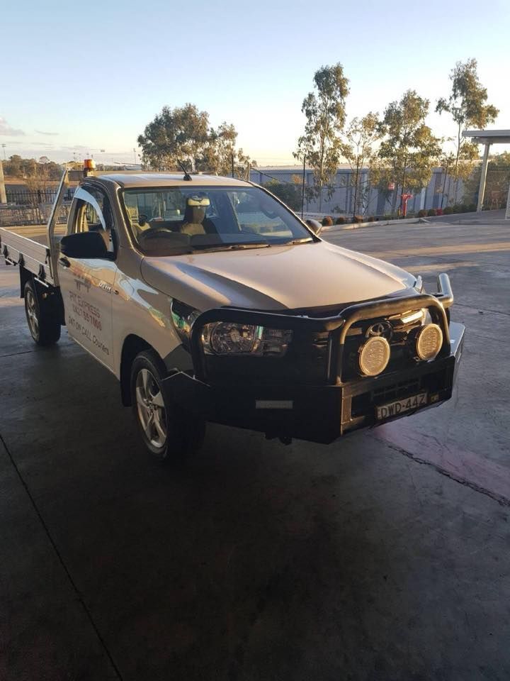 A White Truck With A Black Bumper Is Parked In A Parking Lot — Pit Express in Singleton, NSW
