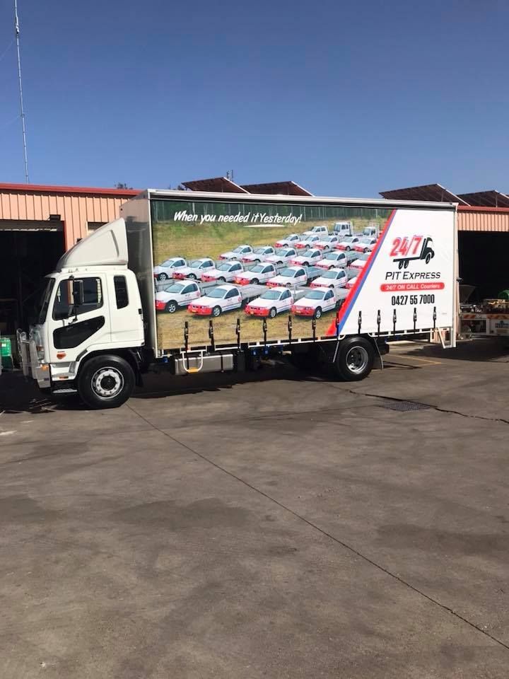 White Truck With a Large Advertisement on the Side — Pit Express in Gold Coast, QLD