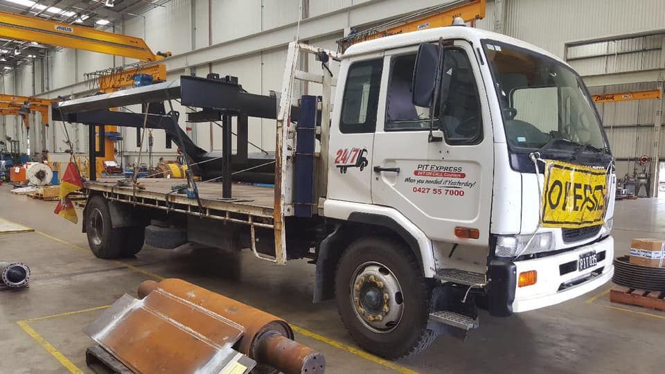 White Truck is Parked in a Warehouse — Pit Express in Welshpool, WA