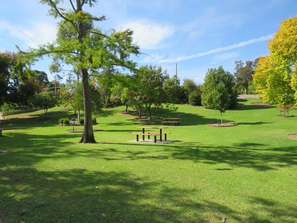 There is a Picnic Table in the Middle of the Park — Pit Express in Tullamarine, VIC
