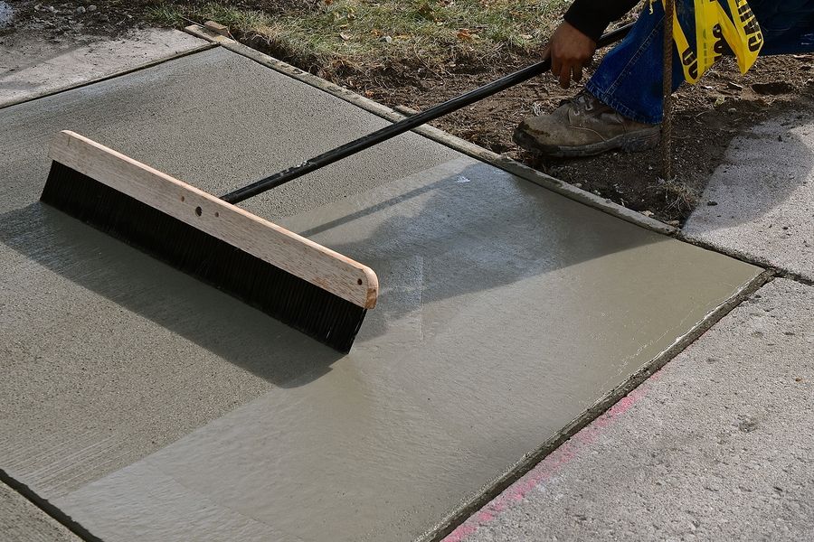Professional concrete sidewalk repair and smoothing St. Pete