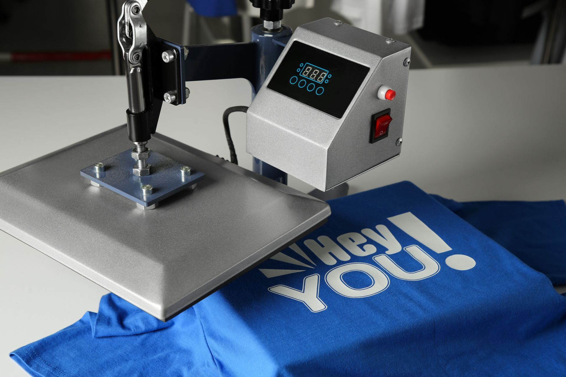 Heat press applying a