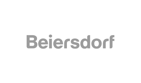 Das Beiersdorf-Firmenlogo mit dem Markennamen in grauer Schrift auf weißem Hintergrund.