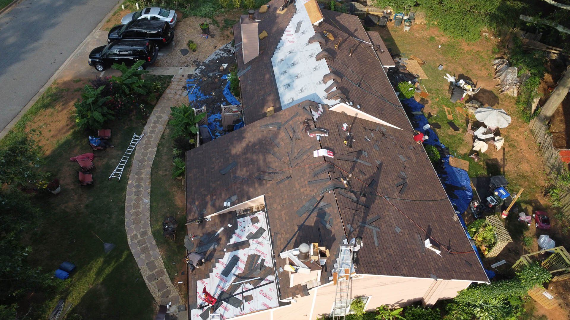 An aerial view of a house that is being remodeled