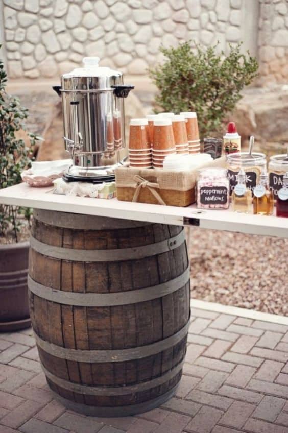 A wooden barrel sitting on top of a table