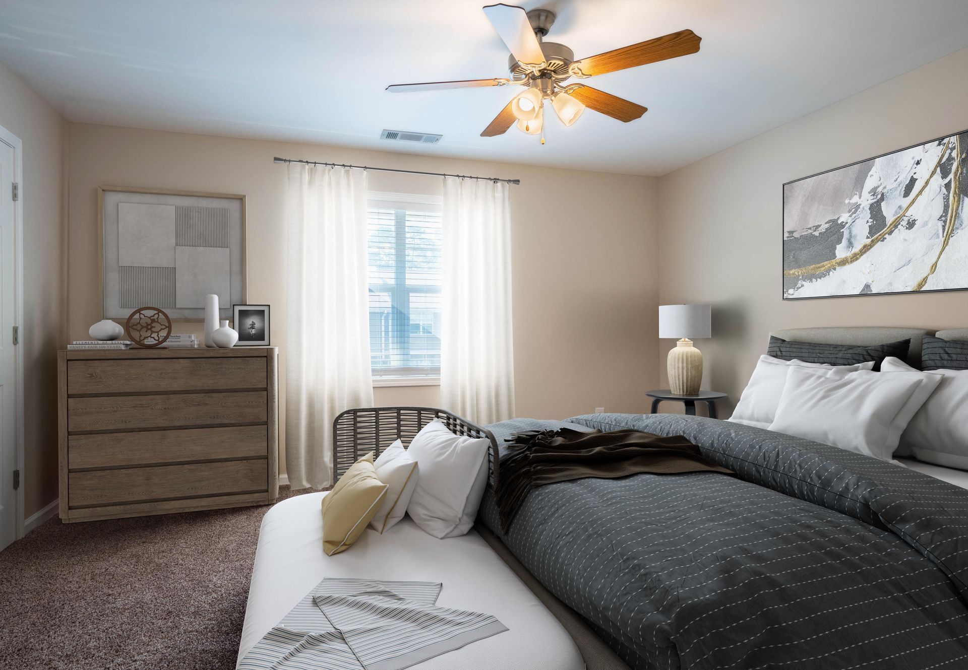 Bright bedroom with a bed, dresser, window, ceiling fan, and gray decor.