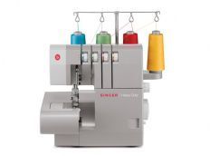 Compact sewing machine with four colorful thread cones on top and a yellow spool at the right