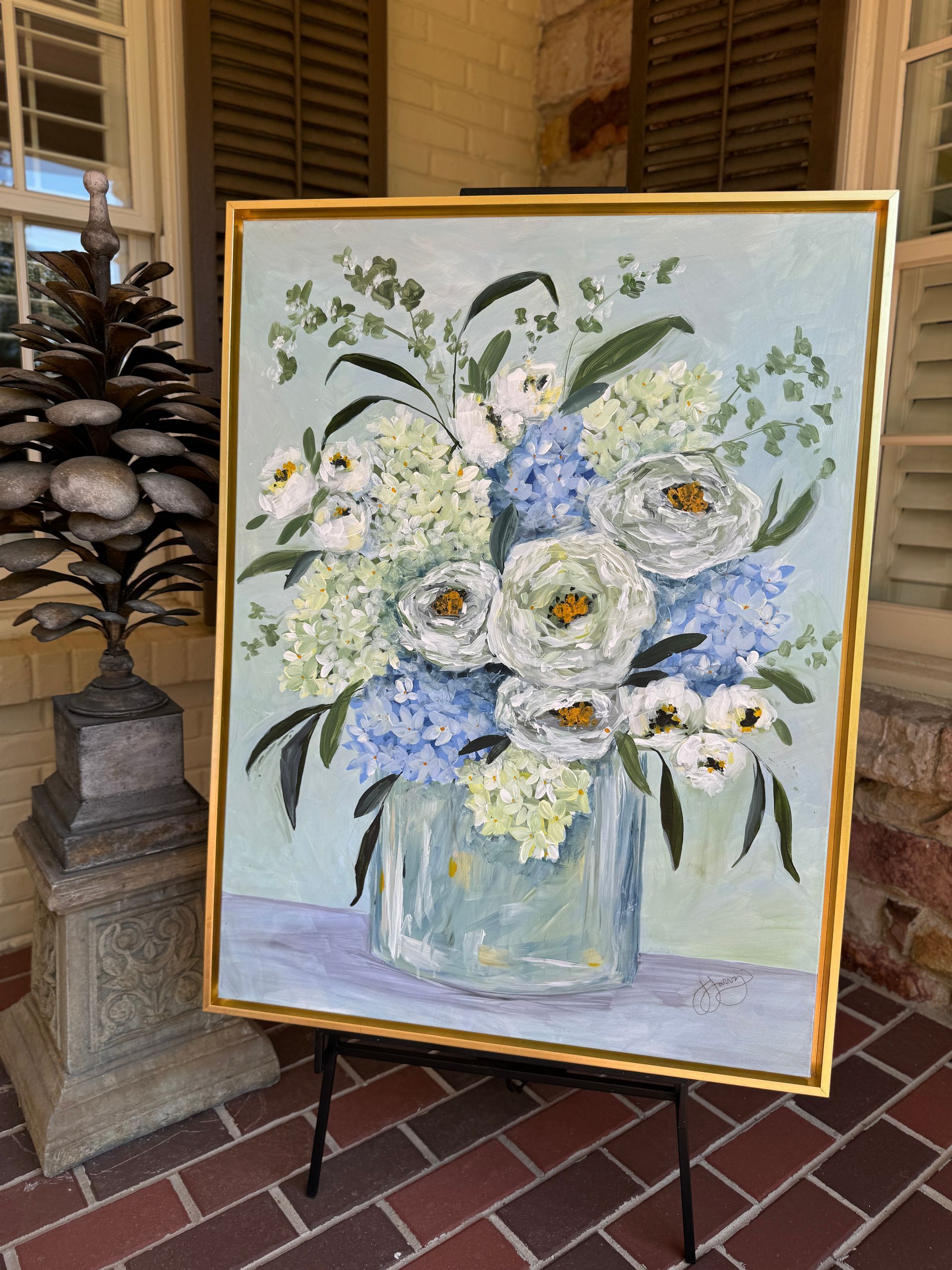 bold floral painting with white, blue and greens