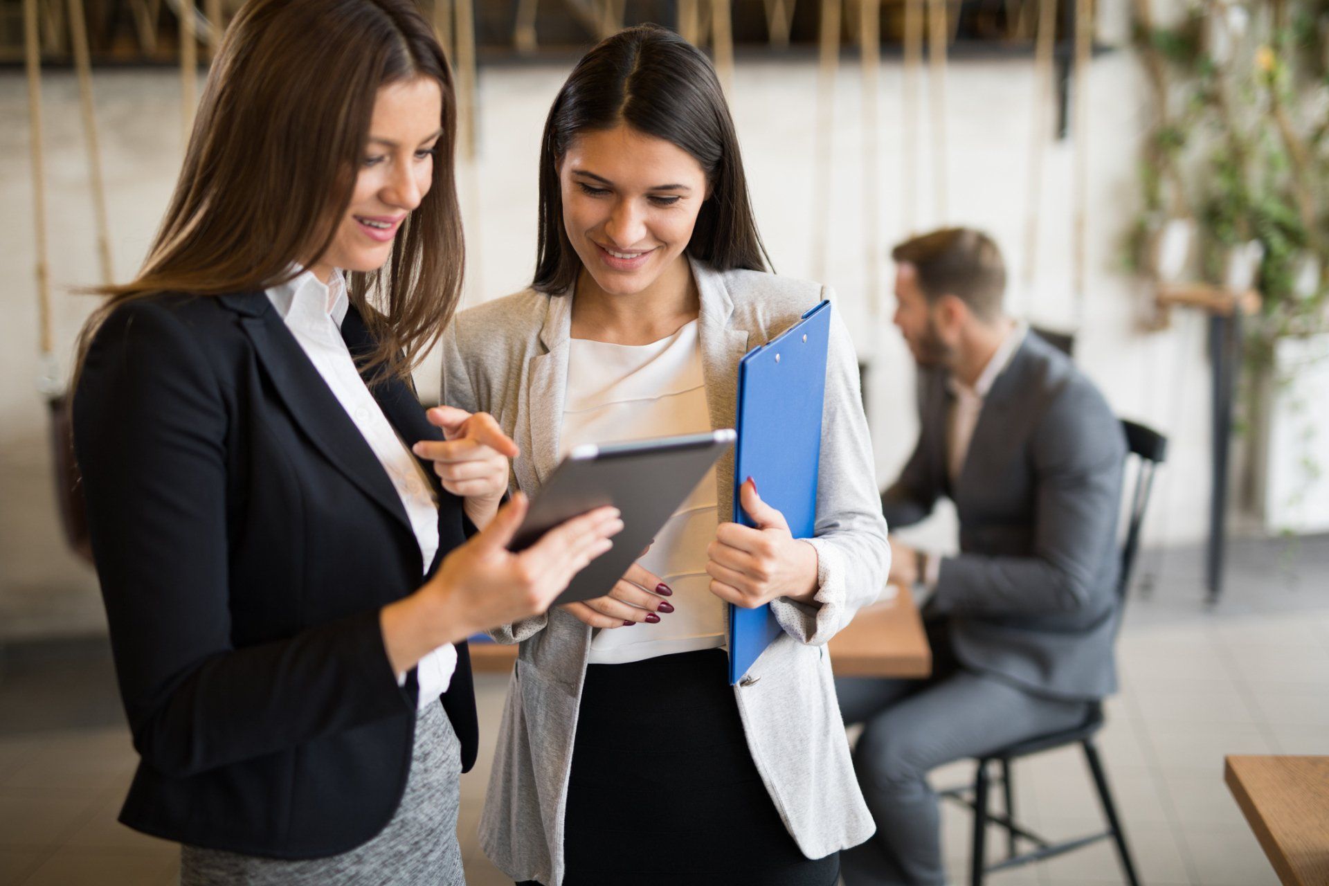 Two Women Discussing Insurance — Glassboro, NJ — Delsea Insurance Agency Two Women Discussing Insurance — Glassboro, NJ — Delsea Insurance Agency