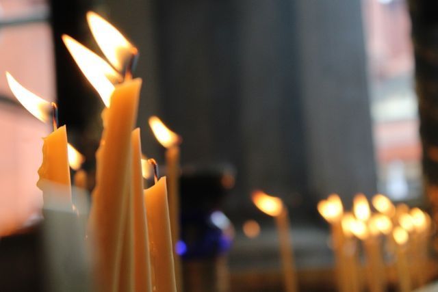 Warm candlelight tribute representing remembrance and healing at a Kennett Square, PA funeral home and cremations service