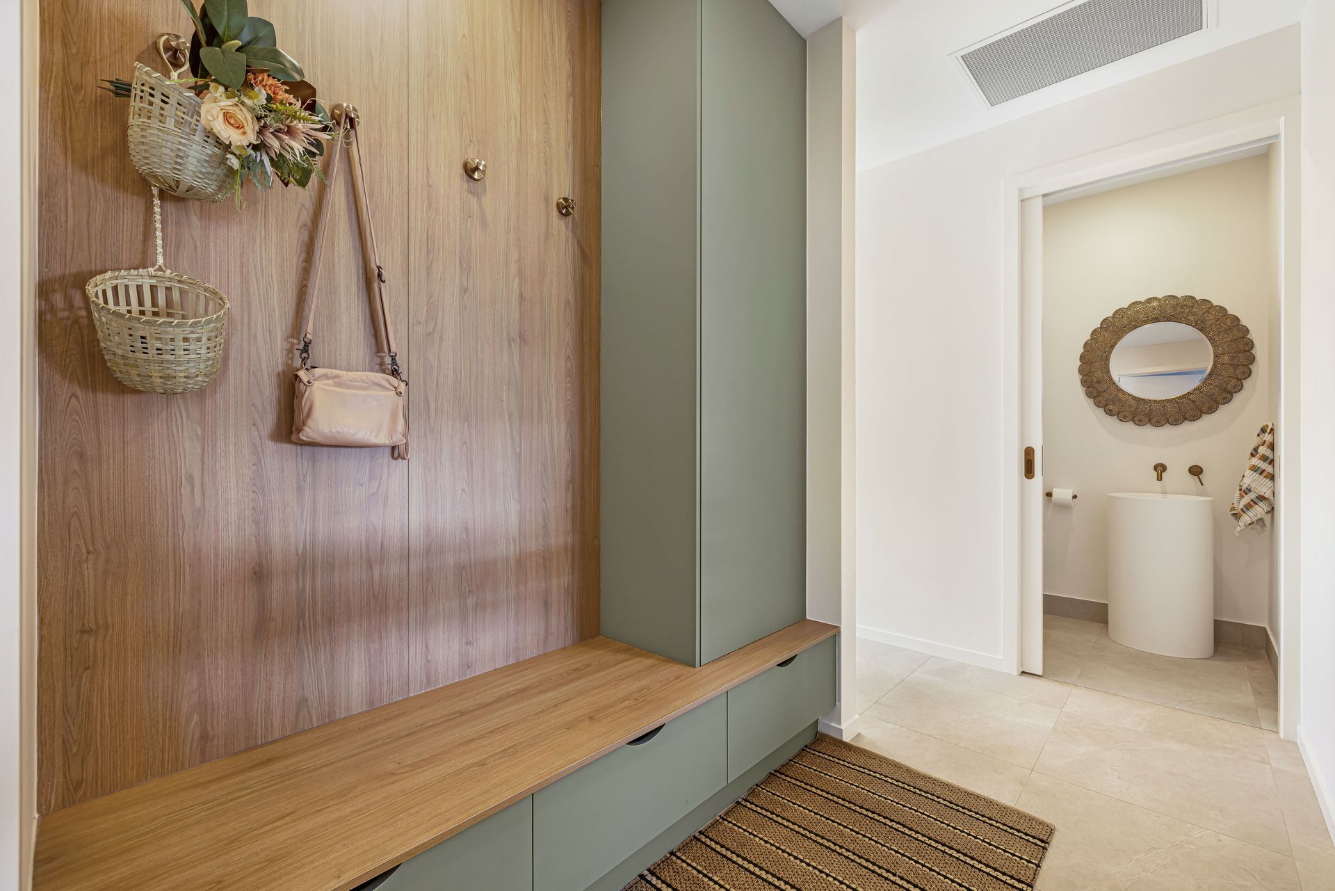 White Pantry With Shelves, Cabinets, And A Teal Backsplash — Master Cabinets Bundaberg in Kensington, QLD