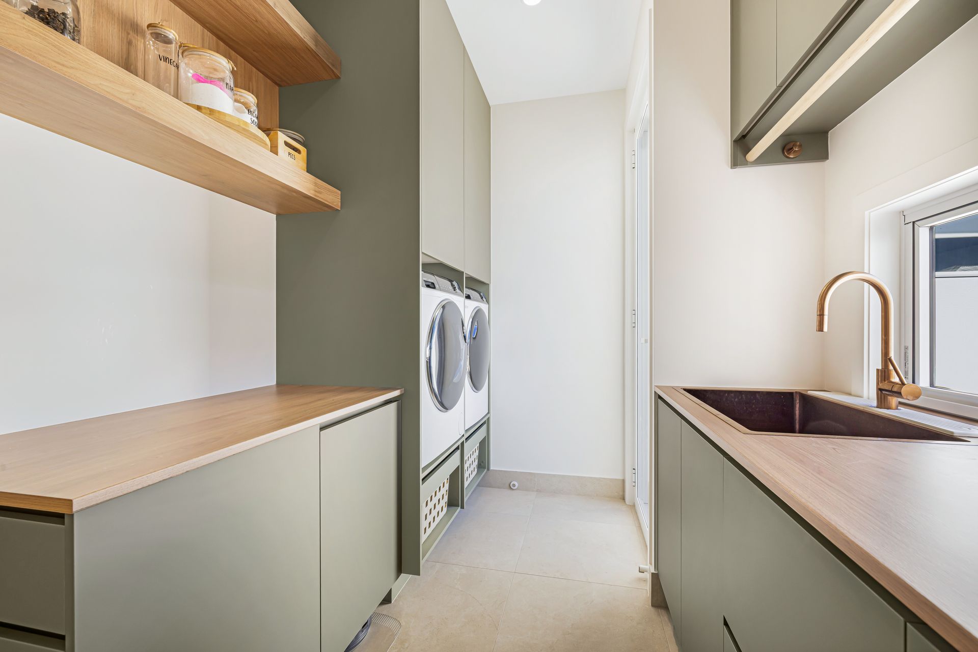 A Bathroom With Two Sinks And A Large Mirror — Master Cabinets Bundaberg in Kensington, QLD