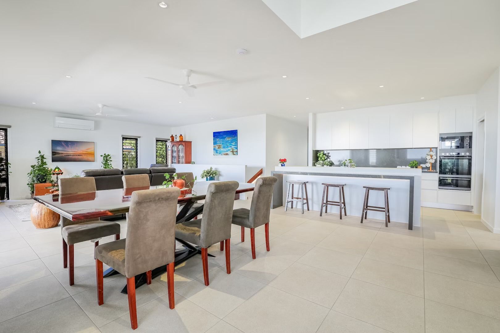 Modern White Kitchen With Island — Master Cabinets Bundaberg in Kensington, QLD