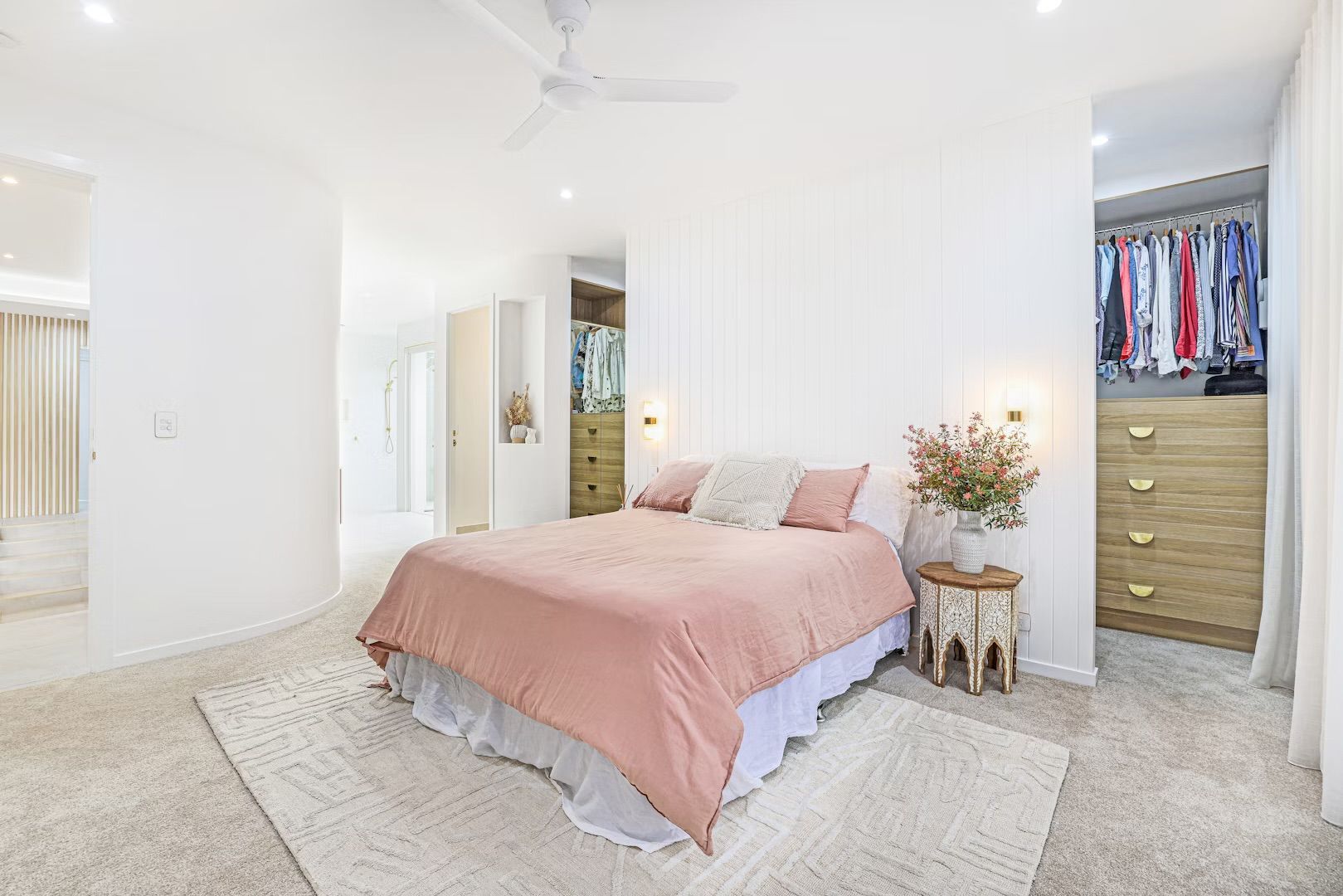 A Kitchen With White Cabinets And A Sink — Master Cabinets Bundaberg in Bargara, QLD