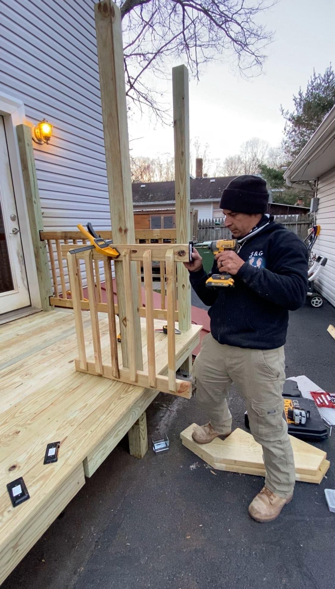 Jaime from J & G Cleaning building a custom deck in Plainville Connecticut