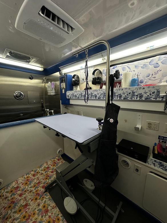 Clean and thoughtfully equipped Roman’s Empire mobile grooming salon serving Folsom, CA