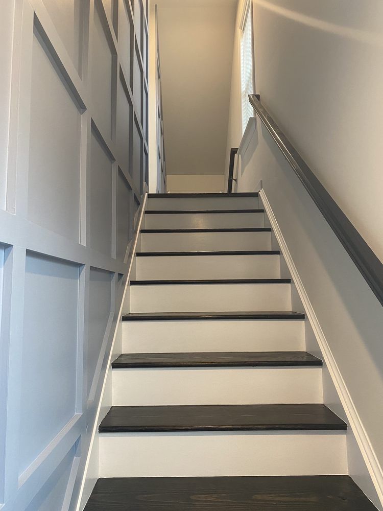 A set of stairs leading up to the second floor of a house