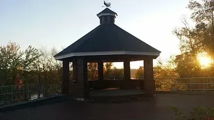 Chimney-Sweep-Portland-A gazebo with a weather vane on top of it