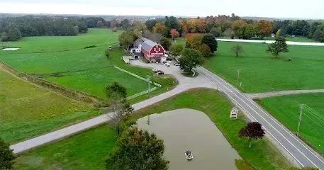 Chimney-Sweep-Portland-An aerial view of a farm with a barn and a road.
