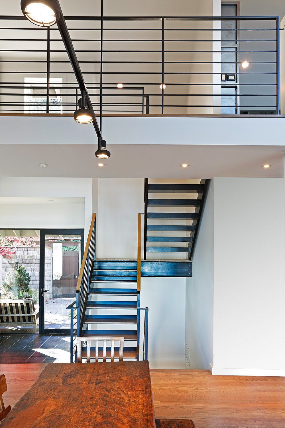 A staircase leading up to the second floor of a house