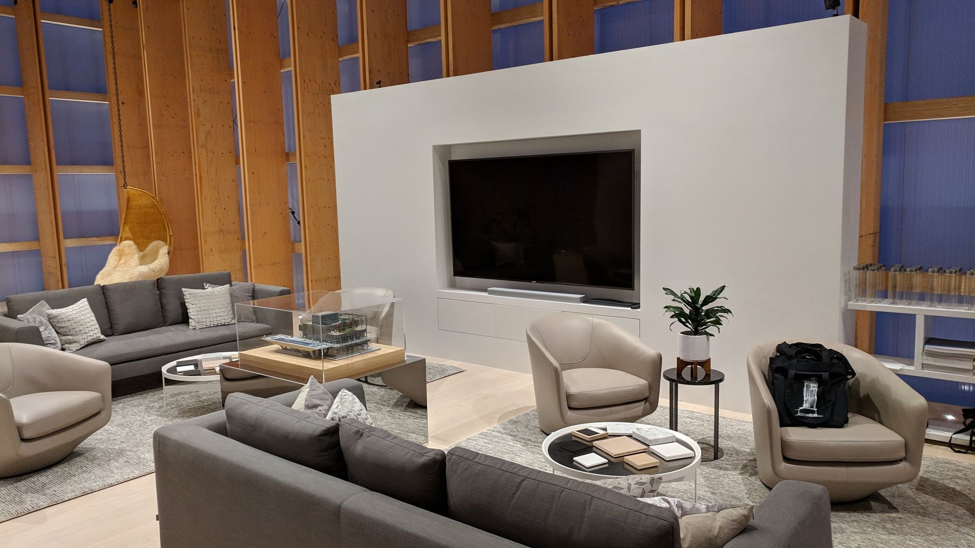 A living room filled with furniture and a flat screen tv.