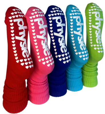A row of socks with the custom branding for Pilates studio