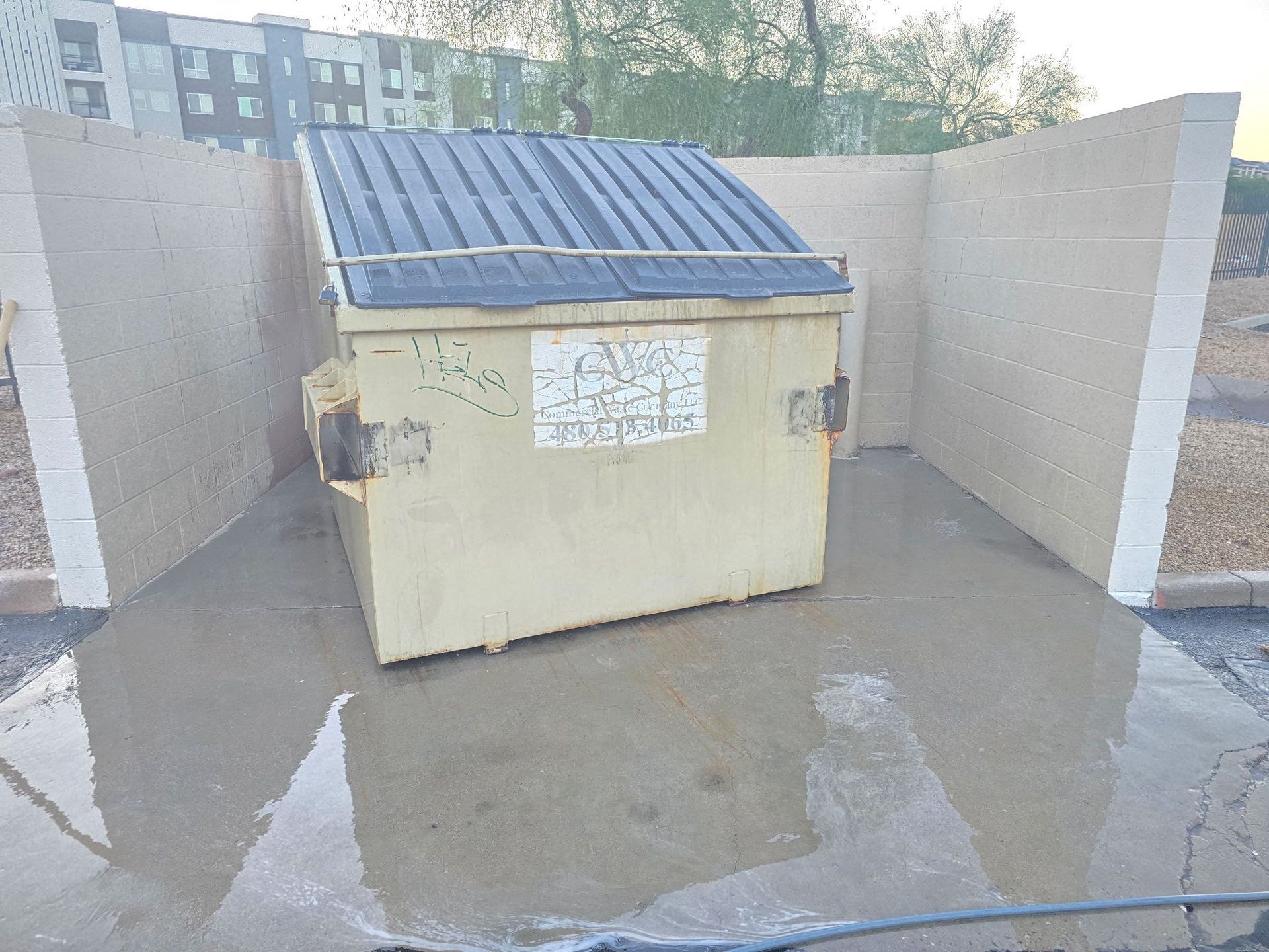 Dumpster pad power washing in Phoenix Arizona by Valley Pro Power Wash