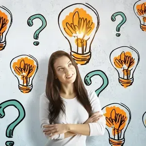 Woman standing with arms crossed, looking up, surrounded by orange lightbulb icons and teal question marks