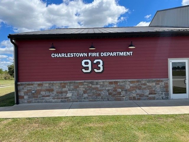 A red building with the number 93 on it.