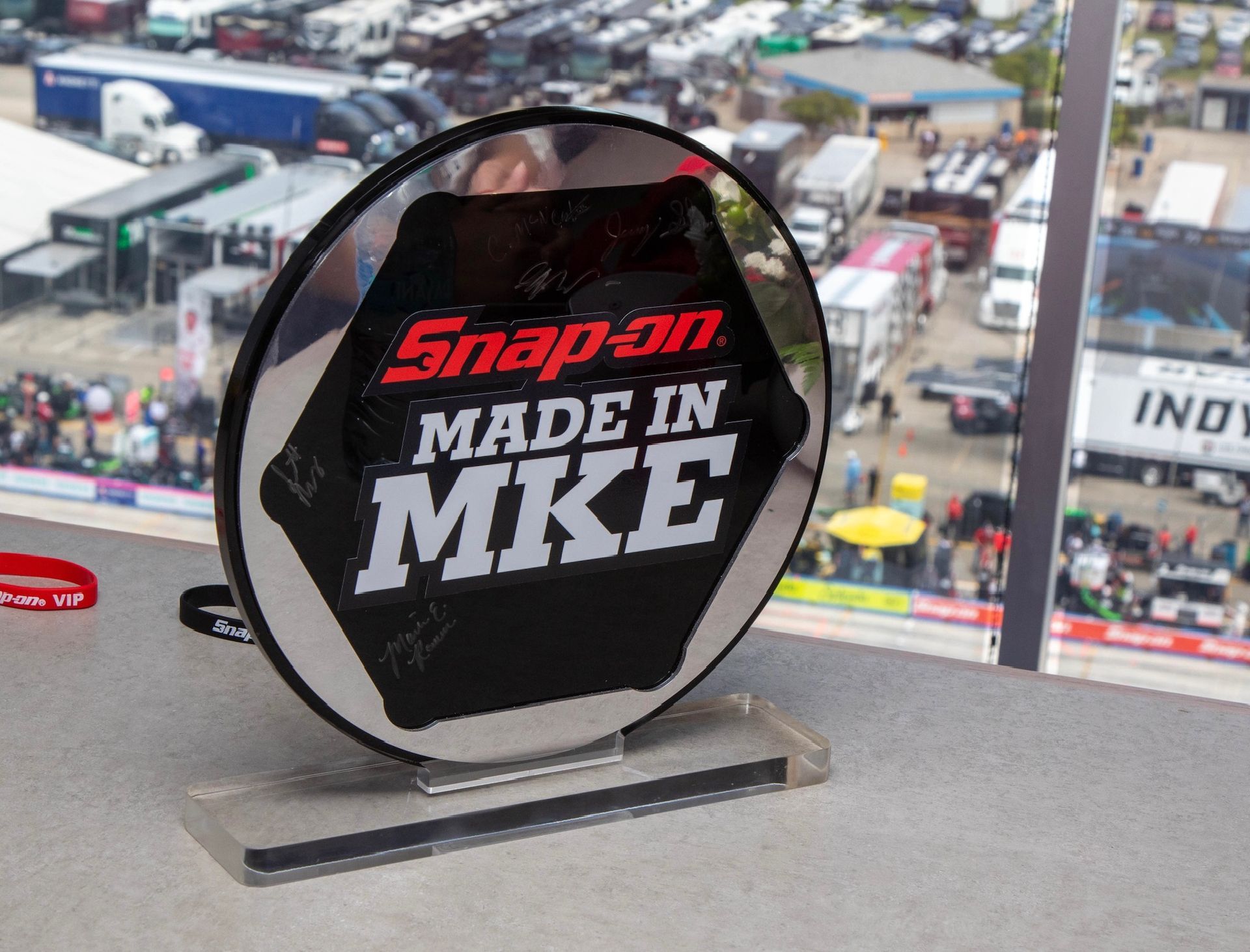 Snap-on tool display: large black and silver emblem with 