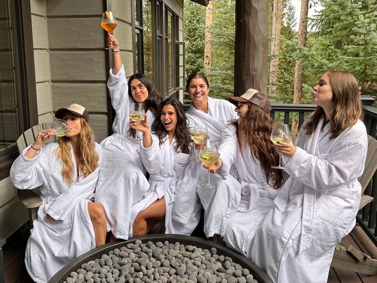 Friends enjoying a luxury mountain getaway in Breckenridge Colorado