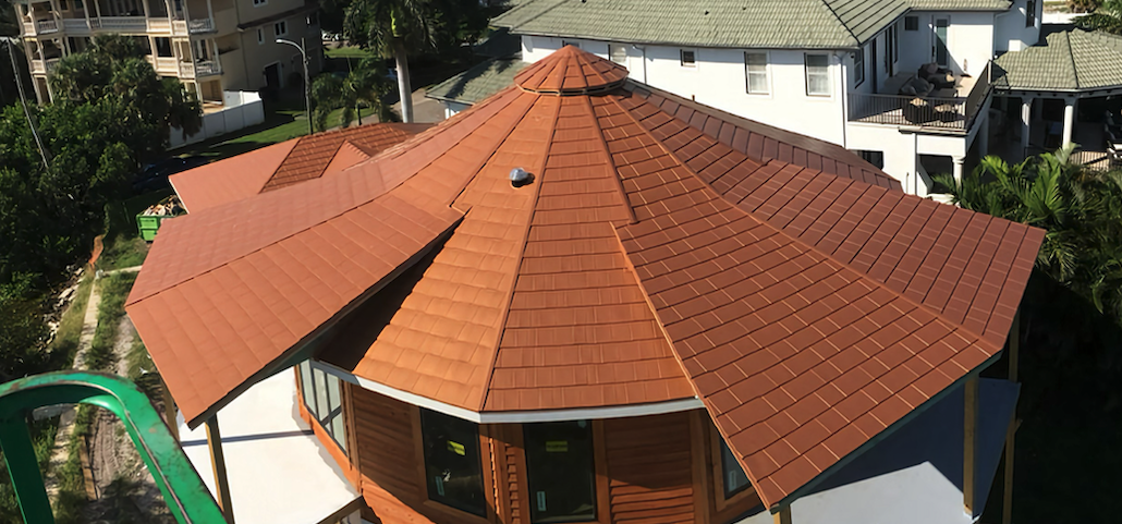 Close-up view of sleek metal shingles reflecting the Florida sunshine.