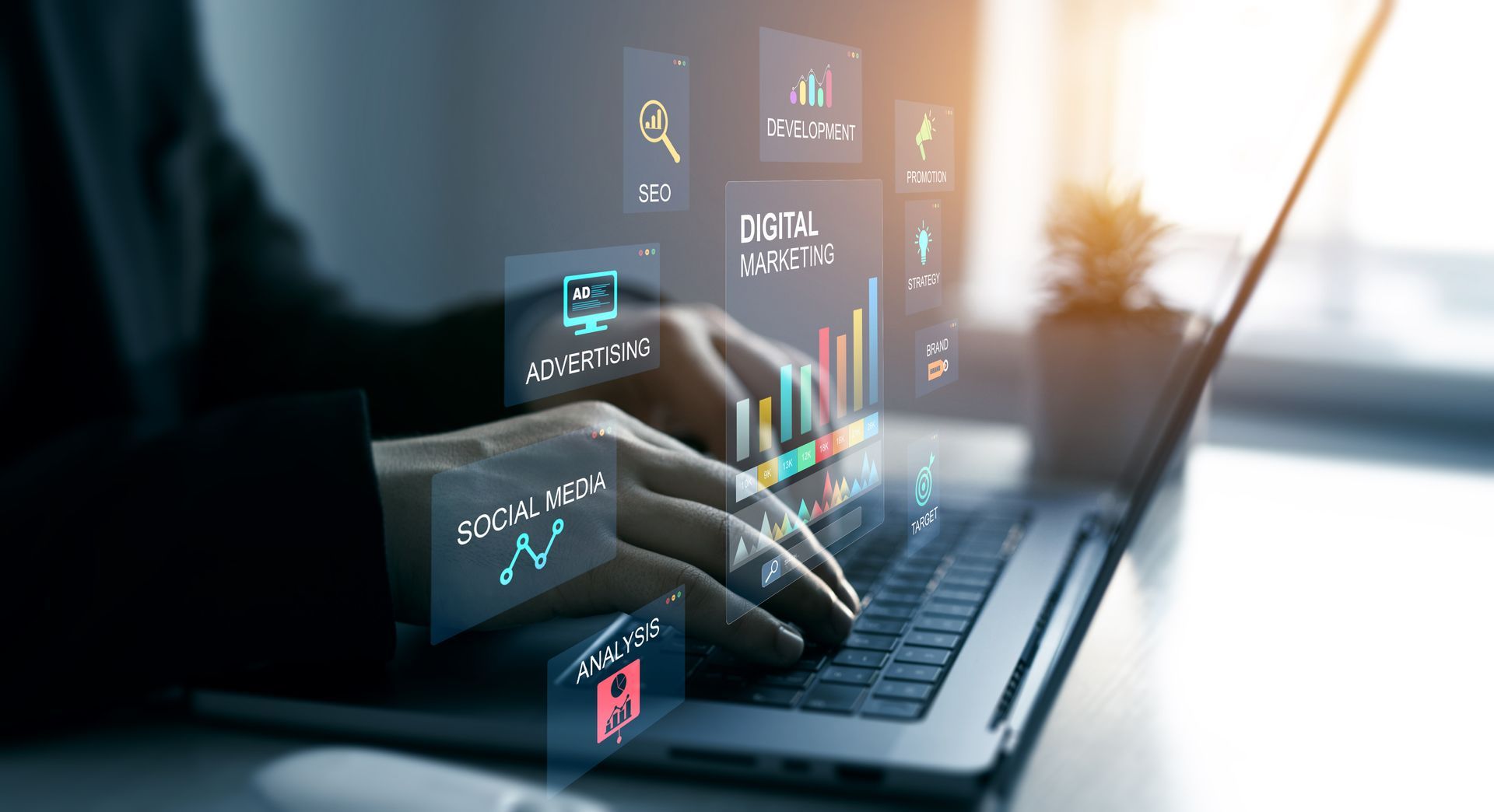 Hands typing on a laptop with floating digital analytics charts and icons in a dim office setting