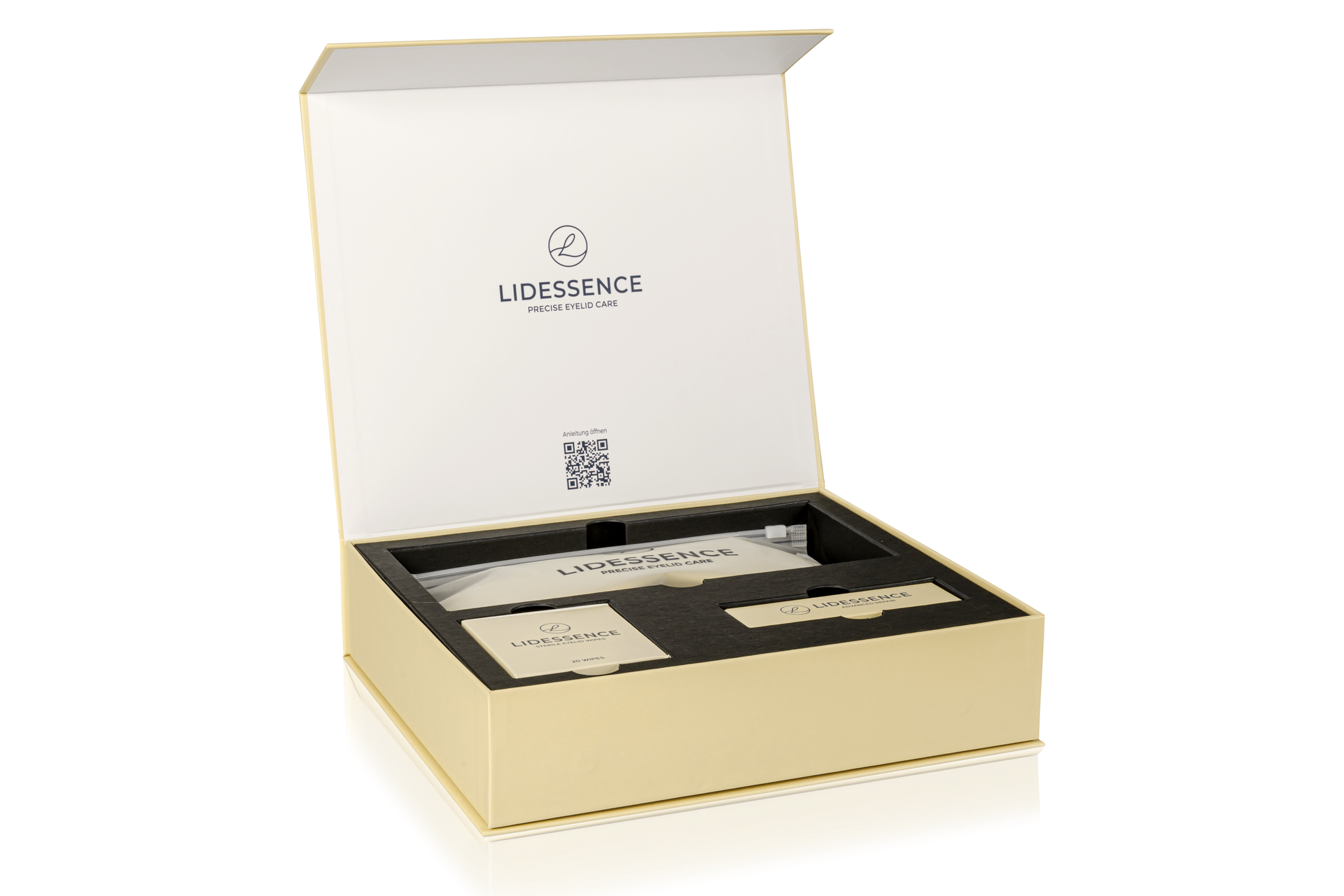 Luxuriöse Geschenkbox mit beiger Aussenseite, schwarzer Innenseite und einem cremefarbenen Accessoire als Dekoration.